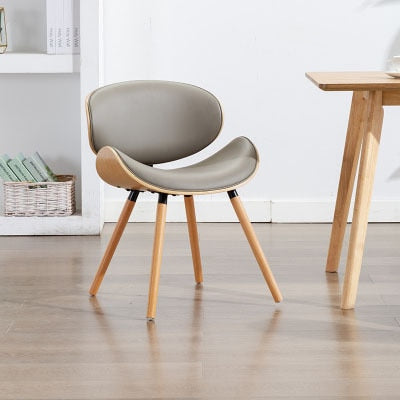 European modern simple luxury chair back, beetle shape small family, space saving practical solid wood leather dining chair