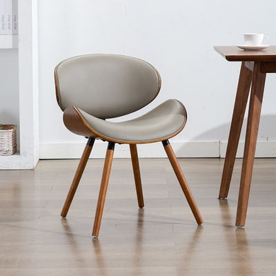 European modern simple luxury chair back, beetle shape small family, space saving practical solid wood leather dining chair